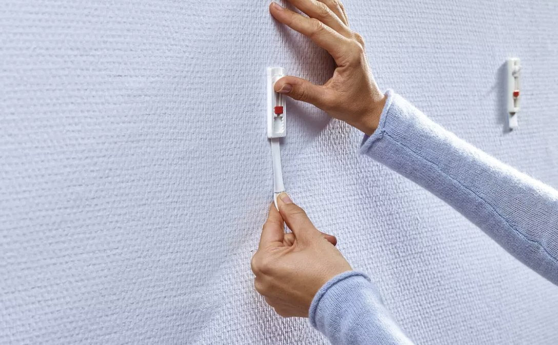 Tesa Pack De 2 Clavo Adhesivo Ajustable Hasta 1kg Para Pared Lisa