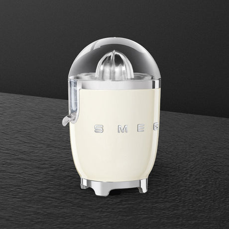 EAN 8017709318888 - Smeg CJF11CREU prensa de cítricos eléctricos 70 W Crema de color imagen 5