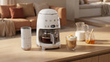 EAN 8017709353148 - Smeg MFF02WHEU espumador o calentador de leche Calentador/espumador de leche automático Blanco imagen 26