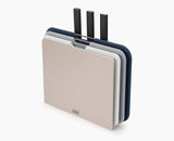 Joseph Joseph Nest Plus Tabla De Cortar + Cuchillo - Set