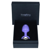 Plug Anal De Metal Púrpura Rosebud Con Joya Transparene